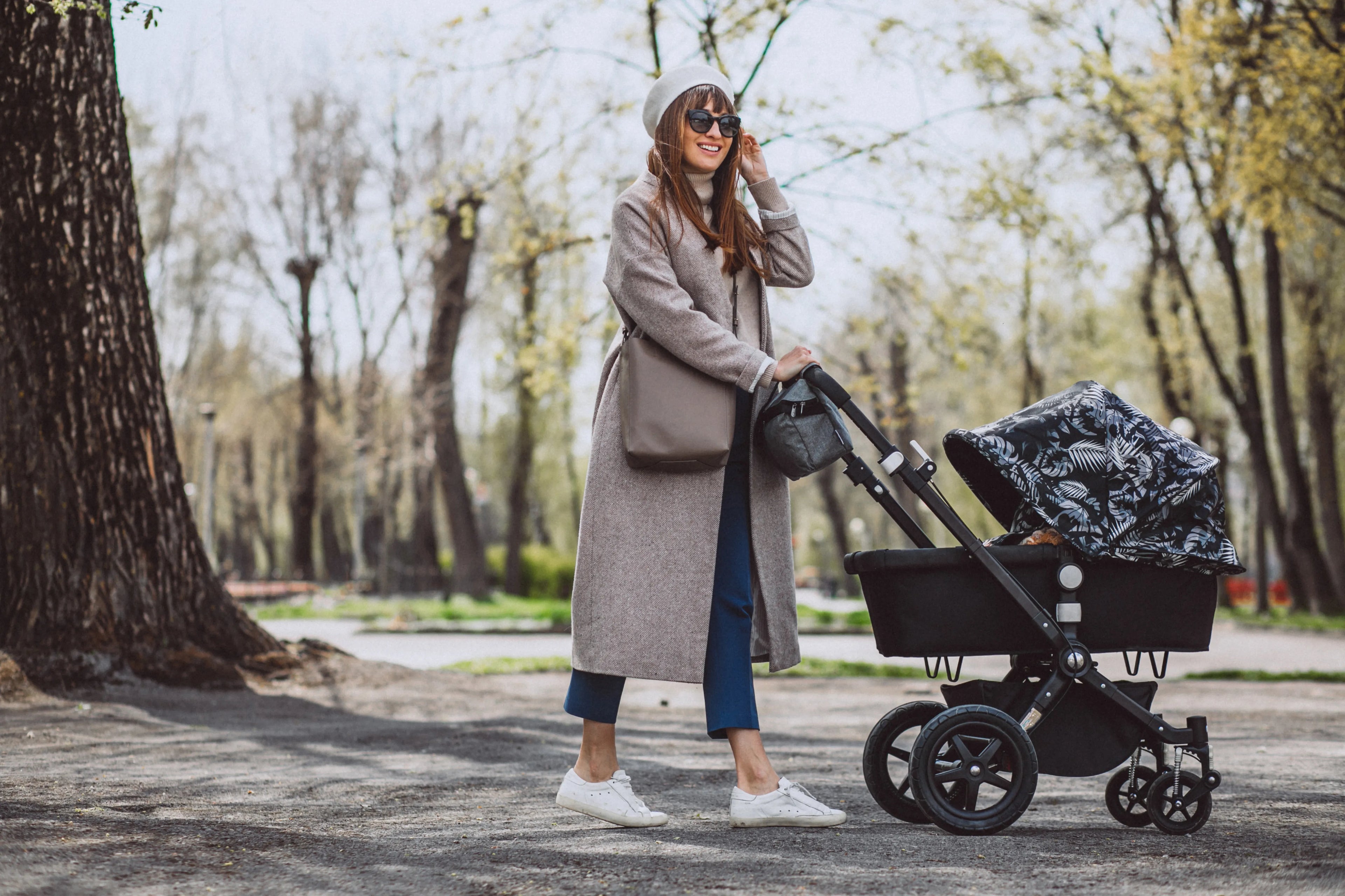 Parents_pushing_a_stroller